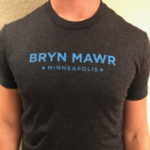 Black t-shirt with blue lettering